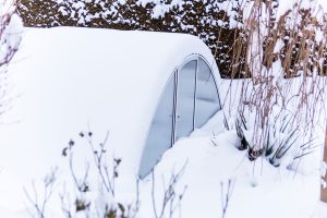 Gewächshaus im Schnee